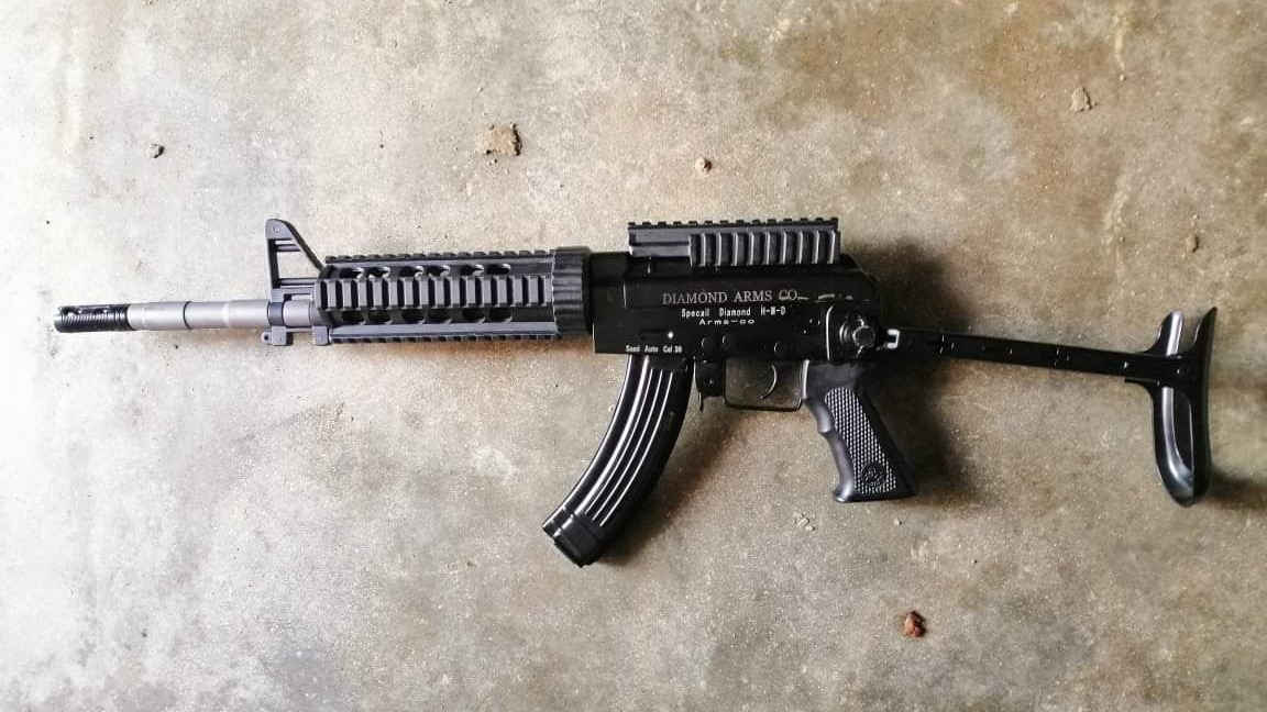 Darra: An AK sub-gun based of an AKMS but modified to resemble an M4 to a degree (Source social media) Darra: An AK sub-gun based of an AKMS but modified to resemble an M4 to a degree (Source social media)